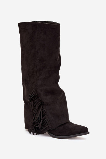 Close-up view of eco-suede slip-on cowboy heel boots by Step in Style, featuring pointed toes and chic fringe accents for a sophisticated look.