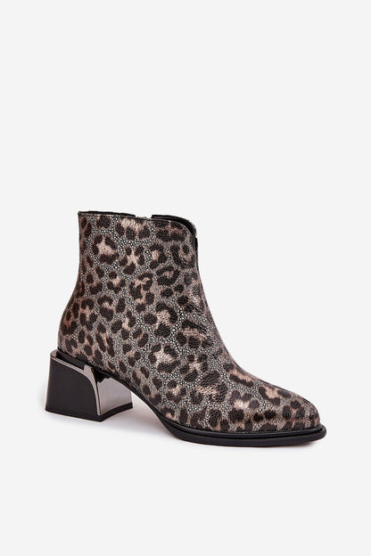 Stylish women's ankle boots in leopard print from Step in Style, made with premium natural leather, showcasing a comfortable block heel for elegance and support.