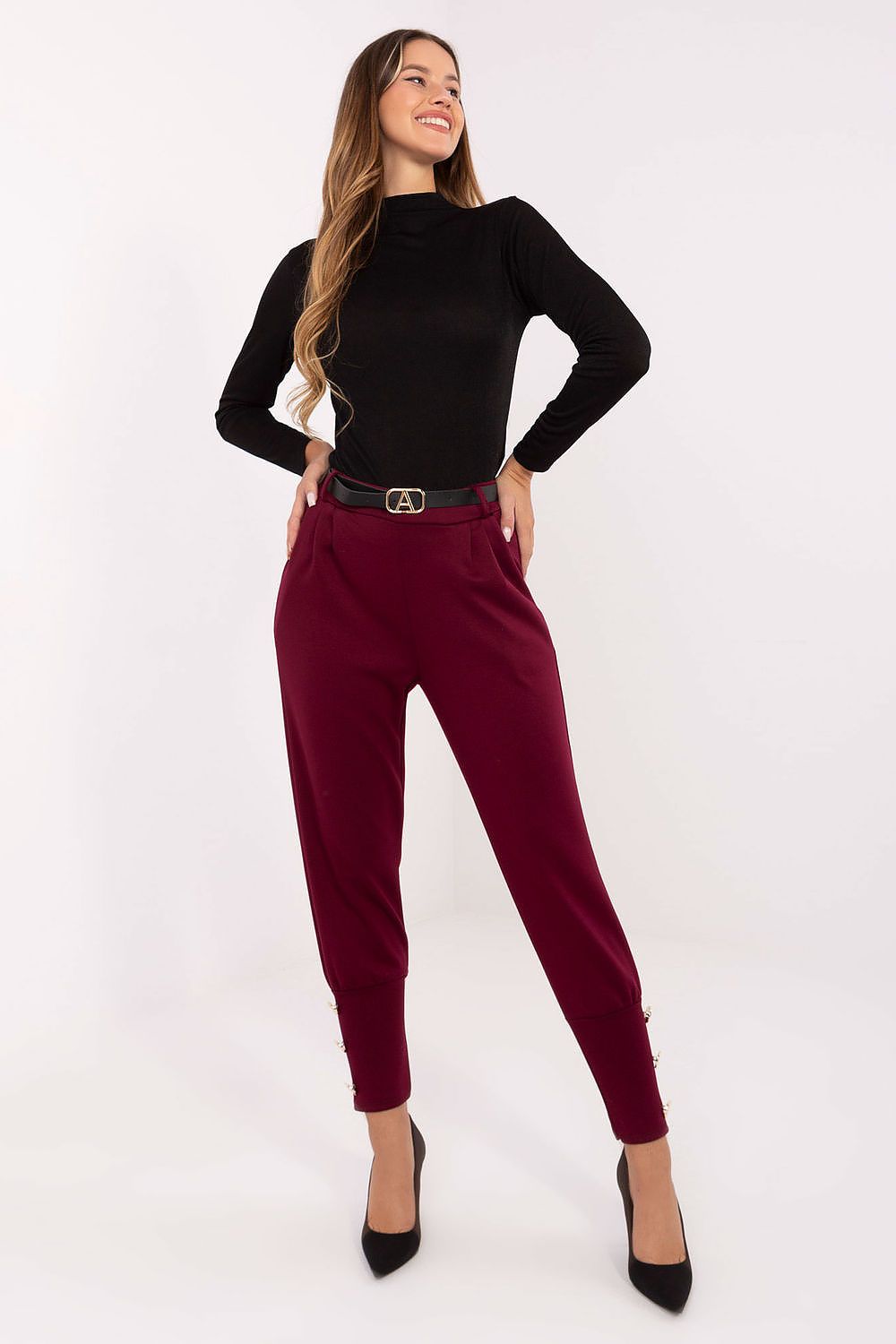 High-waisted women's sweatpants from Factory Price, featuring elegant decorative cuffs and functional pockets, perfect for casual urban wear.