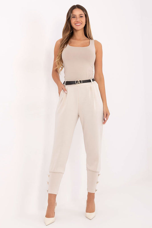 Luxury women's high-waisted tapered jogger pants by Factory Price, featuring decorative buttons and a refined silhouette, perfect for elegant casual wear.