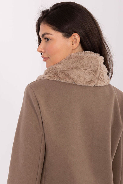 Soft fur neck warmer by AT, perfect for protecting against cold with a touch of luxury and style.