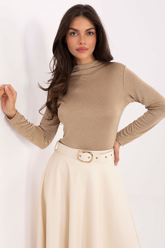 Elegant fitted blouse by Rue Paris featuring decorative studs and a turtleneck design, made of viscose-polyester blend.