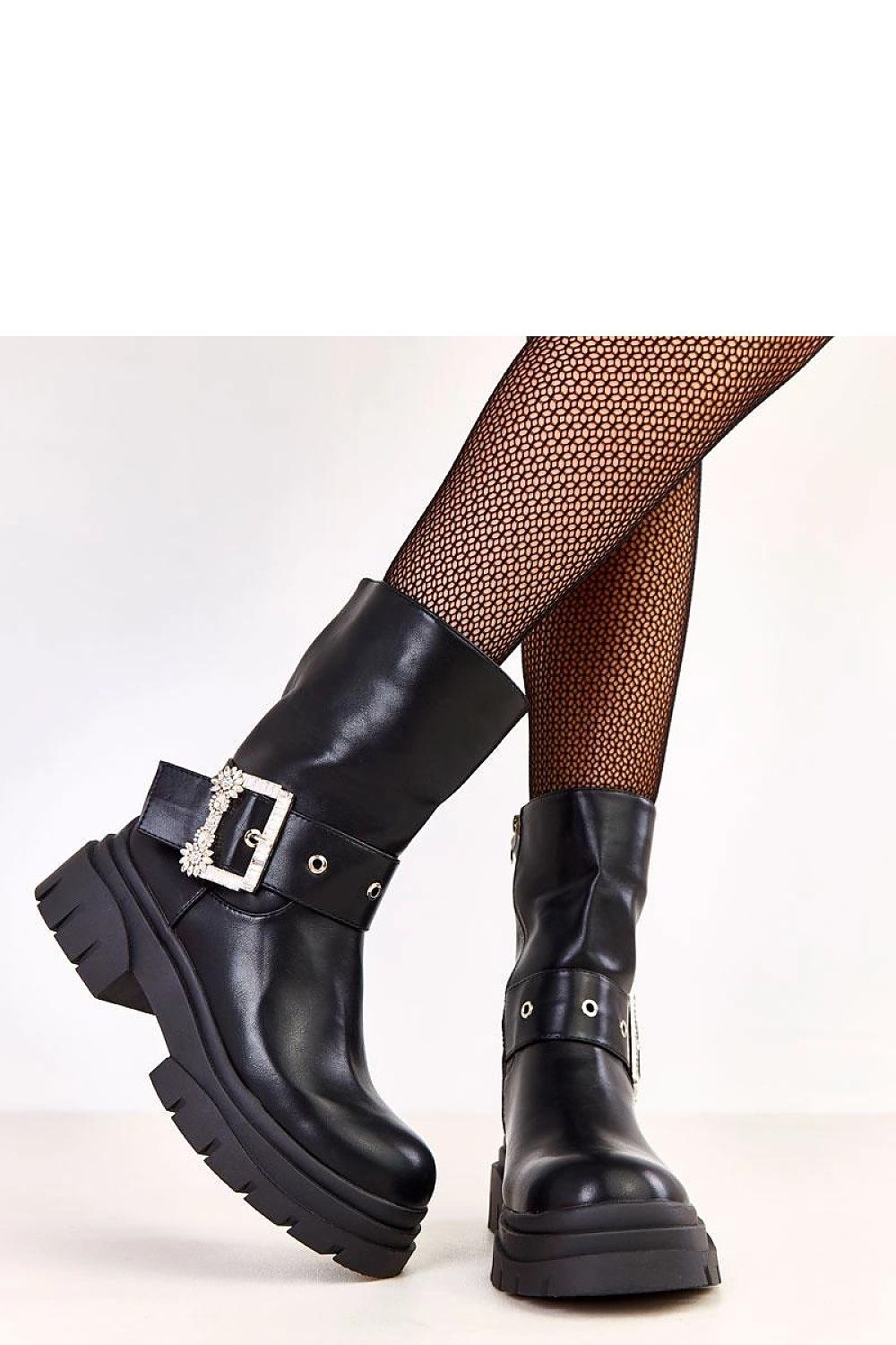 Solea women's eco leather ankle boots displayed in a fashion-forward setting, perfect for chic winter styling.