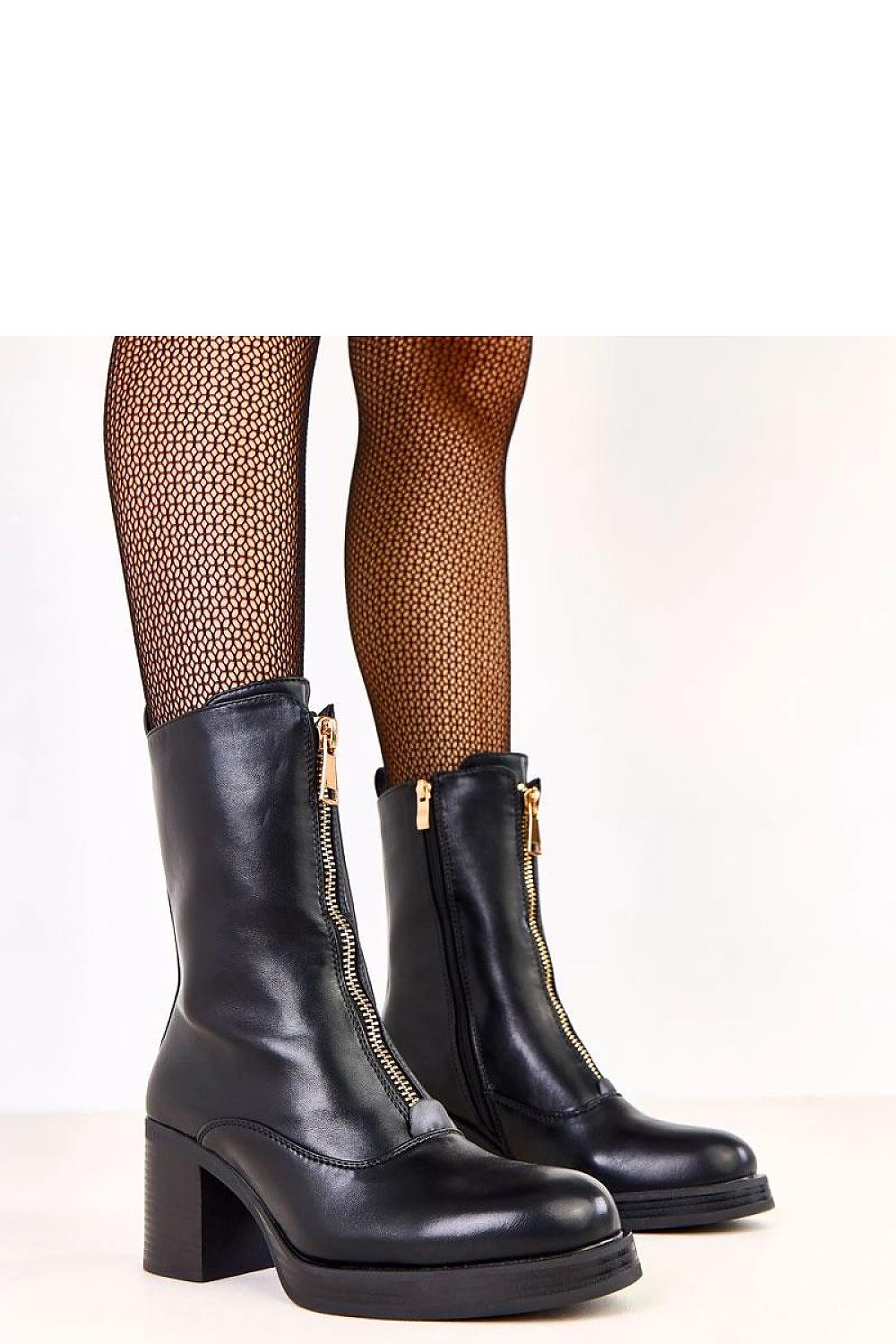 Elegant women's ankle boots in eco leather by Solea, featuring a chic 7.5 cm block heel and stylish front zipper for modern appeal.