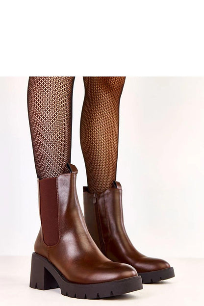 Luxurious women's ankle boots from Solea, featuring eco leather construction and 7.5cm heel for a chic silhouette.