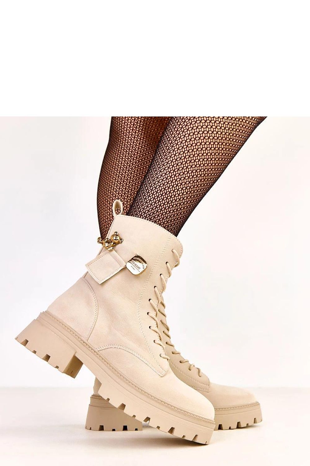 Solea stylish eco-leather women's work boots with a 17cm shaft and insulated lining, elegantly designed for comfort and warmth during colder days. Featuring a round toe, decorative gold teddy bear charm, and a stable 5cm heel, perfect for the modern woman.