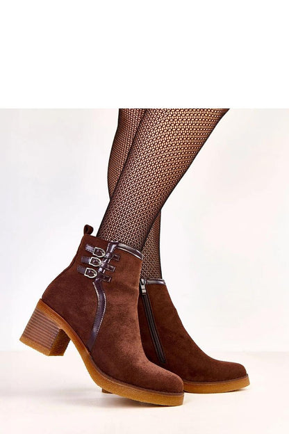 Solea women's ankle boots featuring a comfortable 7cm block heel and round toe design, ideal for everyday elegance.