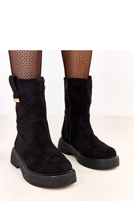 Stylish Solea women's ankle boots in soft faux suede, showcasing a 5cm platform and elegant design, perfect for sophisticated looks.