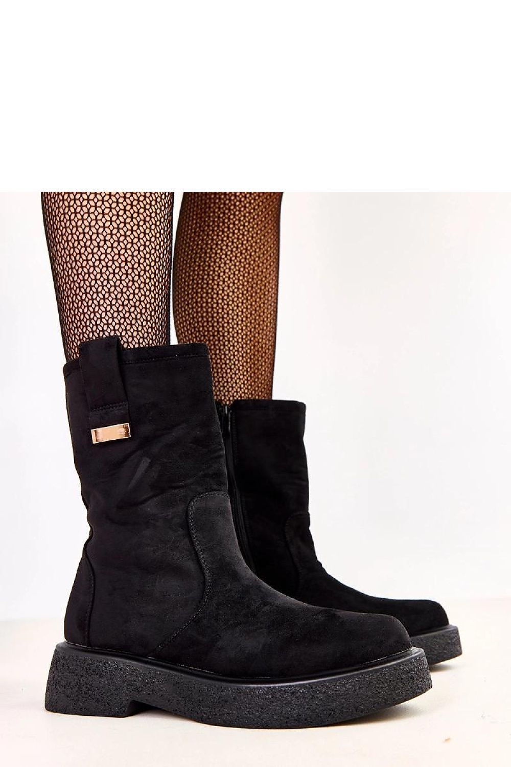 Close-up of Solea women's ankle boots highlighting the round toe and zipper closure, ideal for luxury and comfort during cooler days.