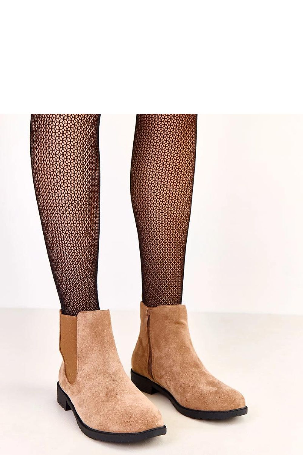 Stylish women's ankle boots in soft suede-like eco leather by Solea, featuring a round toe and 3.5 cm heel for luxurious comfort and elegance.