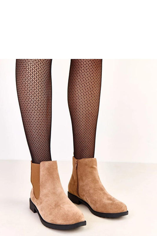 Stylish women's ankle boots in soft suede-like eco leather by Solea, featuring a round toe and 3.5 cm heel for luxurious comfort and elegance.