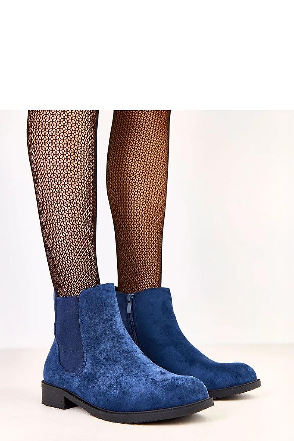 Solea eco-friendly suede ankle boots showcasing modern design with elegant round toe and low heel for luxurious comfort.