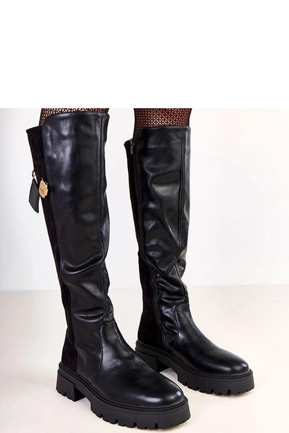 Elegant knee-high thigh-high boots by Solea featuring a sophisticated gold clasp detail, designed for comfort and style in EU sizes 36-41.