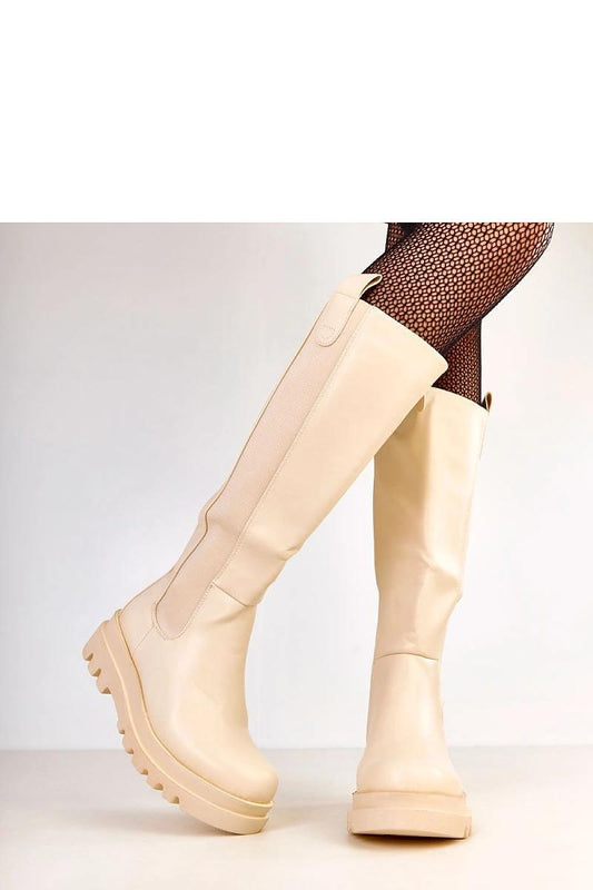 Elegant knee-high boots for women by Solea, crafted from high-quality synthetic leather, featuring a sleek design and 5.5 cm heel for comfort and style.