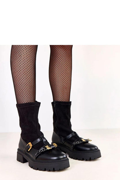 Solea Women's Insulated Eco-Leather Ankle Boots featuring a stylish 20 cm height, adorned with a decorative buckle and teddy bear pendant, perfect for elegant comfort during cooler days.