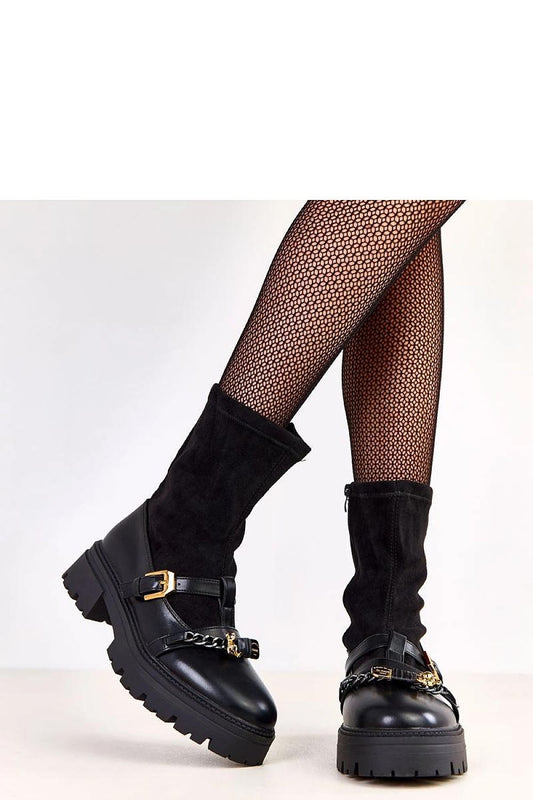 Solea Women's Insulated Ankle Boots in eco-leather featuring 20 cm height, decorative buckle, and teddy bear pendant for a luxurious and fashionable look.