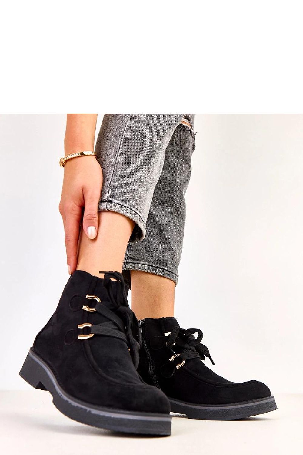 Solea Women's ankle boots in soft faux suede, emphasizing the side zipper for easy wear and the plush fabric insole for added comfort.