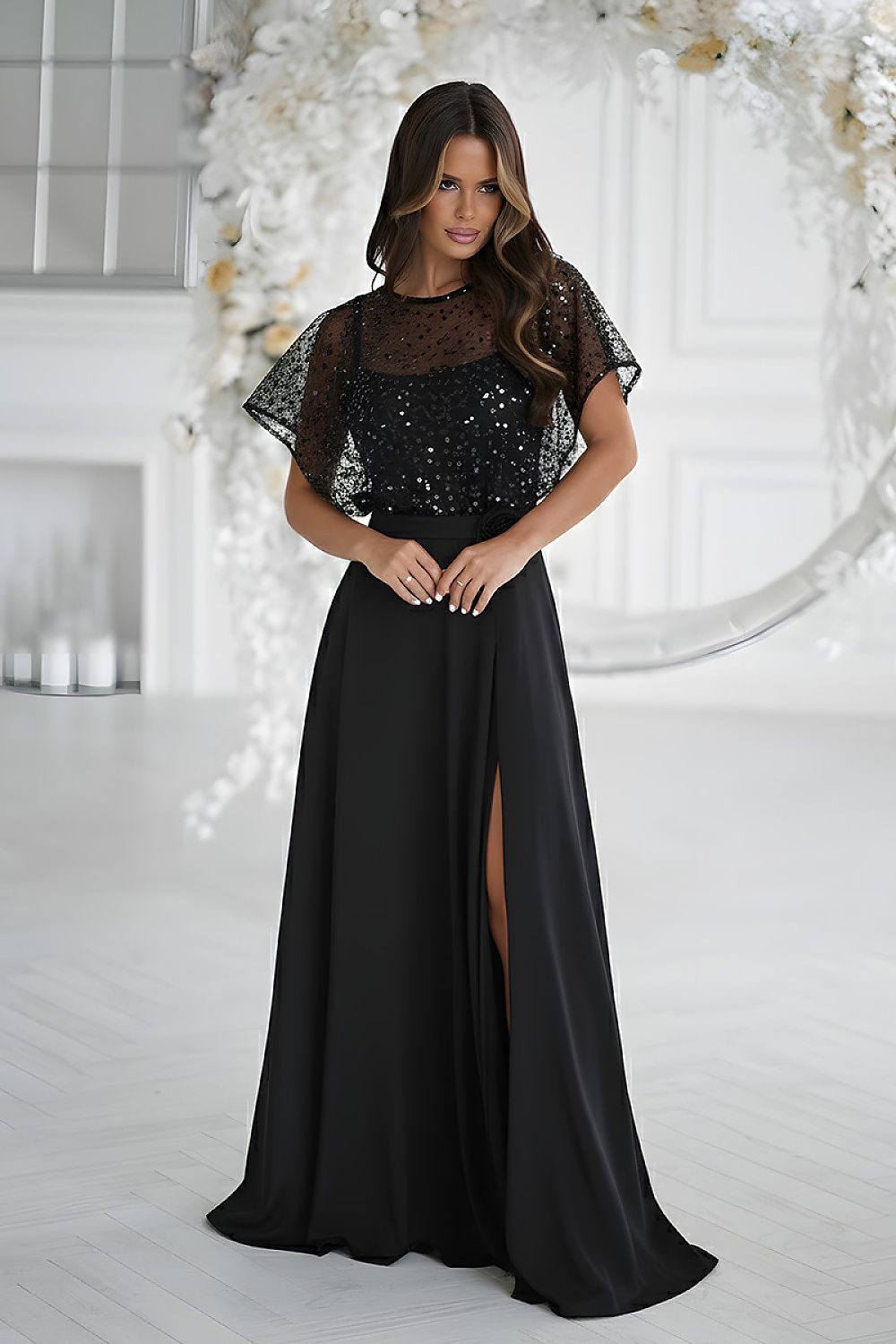 Stunning elegant long dress designed by Bicotone, featuring thin straps and a sparkling sequin bolero adorned with a rose, perfect for luxurious evening occasions.
