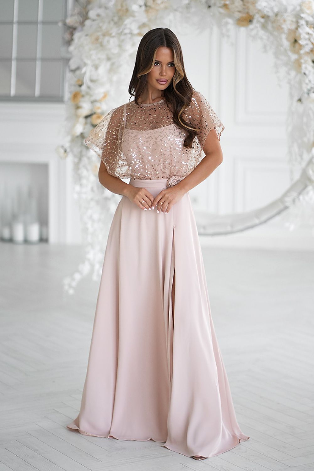 Elegant long dress by Bicotone featuring thin straps and a glamorous sequin bolero with a lovely rose accent, perfect for special occasions.