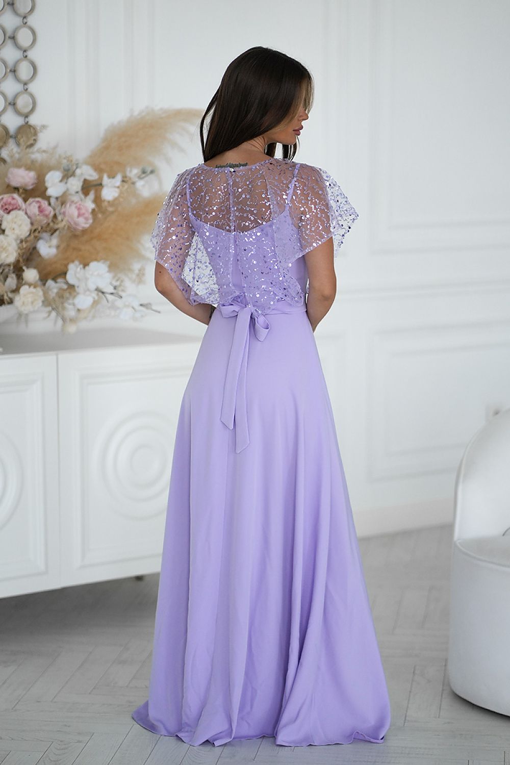 Elegant long dress with sequin bolero by Bicotone, featuring thin straps and a shimmering finish, perfect for special occasions. Available in sizes EU 38-48.