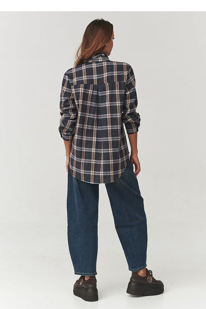 Detail of the Makadamia Long Sleeve Cotton Plaid Shirt, highlighting the soft cotton fabric and sophisticated loose silhouette for timeless elegance.