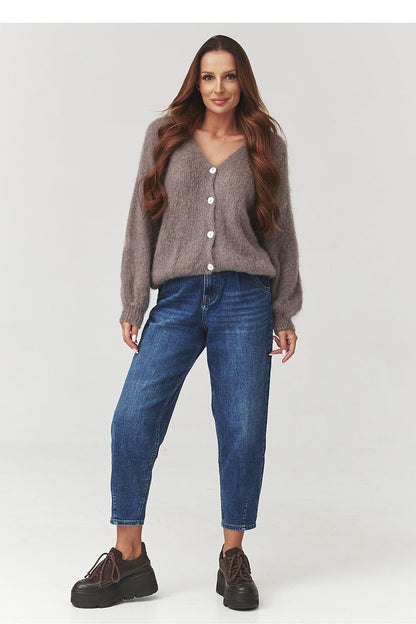 Elegant Makadamia cardigan in mocha, featuring a loose fit and delicate style, ideal for casual and sophisticated outfits during cooler days.