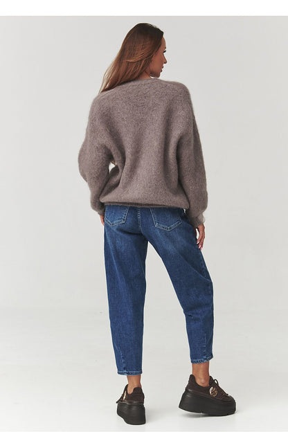 Luxurious oversized Makadamia cardigan in soft mohair blend, displayed in elegant ecru color, perfect for cooler days.