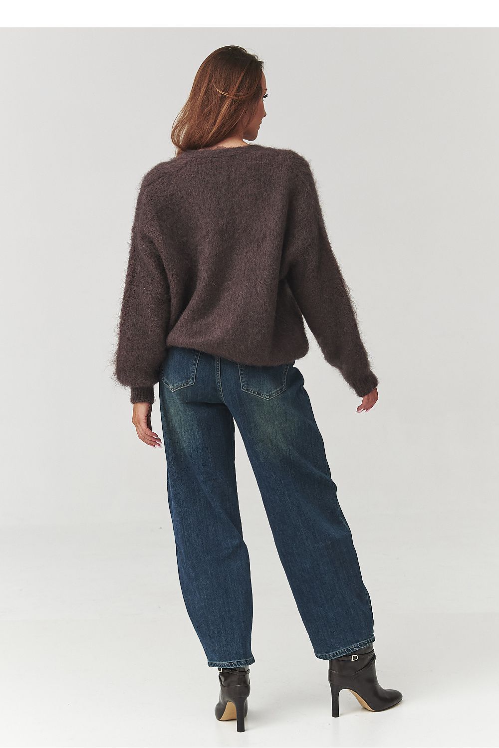 Chic Makadamia cardigan in mocha, showcasing a fluffy texture and elegant oversized design, ideal for stylish winter outfits.