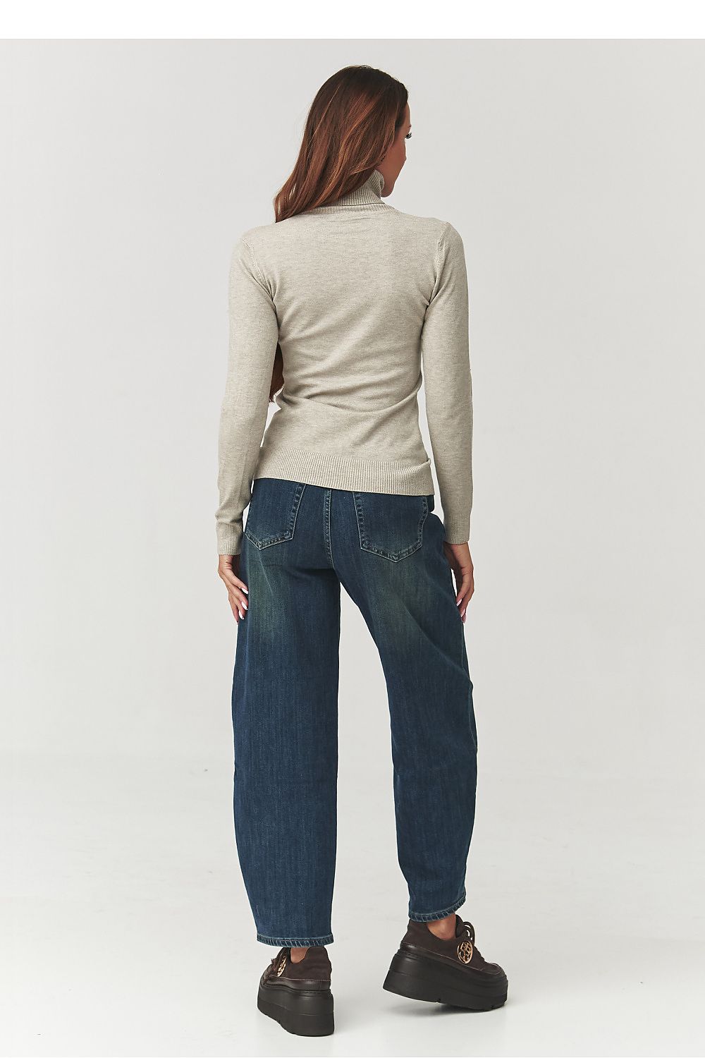 Luxurious Makadamia Women's Turtleneck Golf Top in chocolate colour, designed with a feminine silhouette and made in Italy.