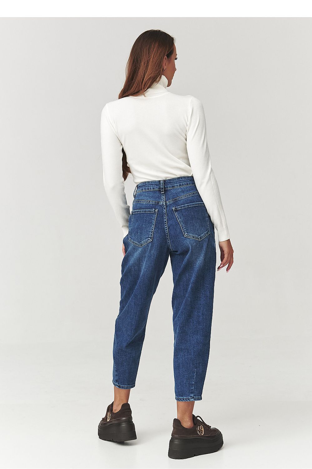 Chic Makadamia women's golf top in rich burgundy, designed for style and comfort, featuring a luxurious viscose blend for an exquisite feel.