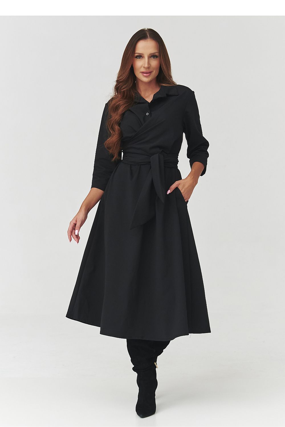 Model wearing the elegant midi shirt dress by Makadamia, demonstrating its versatility for both business and elegant outings.