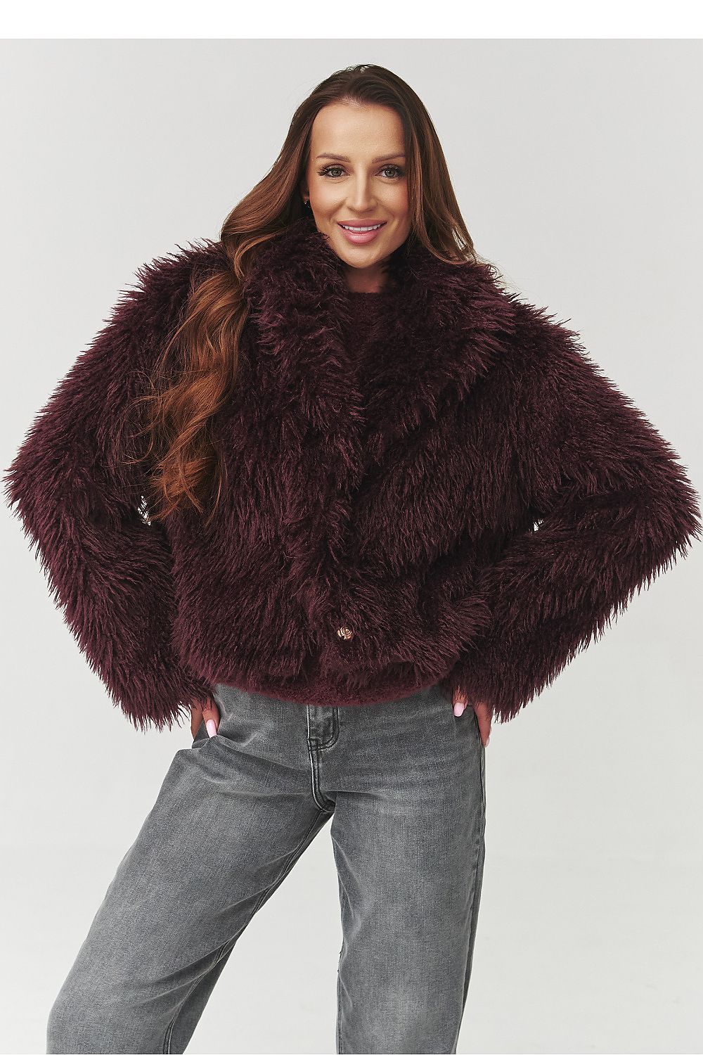 Elegant Makadamia women's short fur jacket in burgundy, designed for warmth and feminine charm, ideal for chilly days.