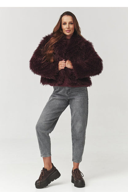 Trendy brown fur jacket by Makadamia, highlighting a stylish short cut that enhances the waist, suitable for both casual and elegant wear.