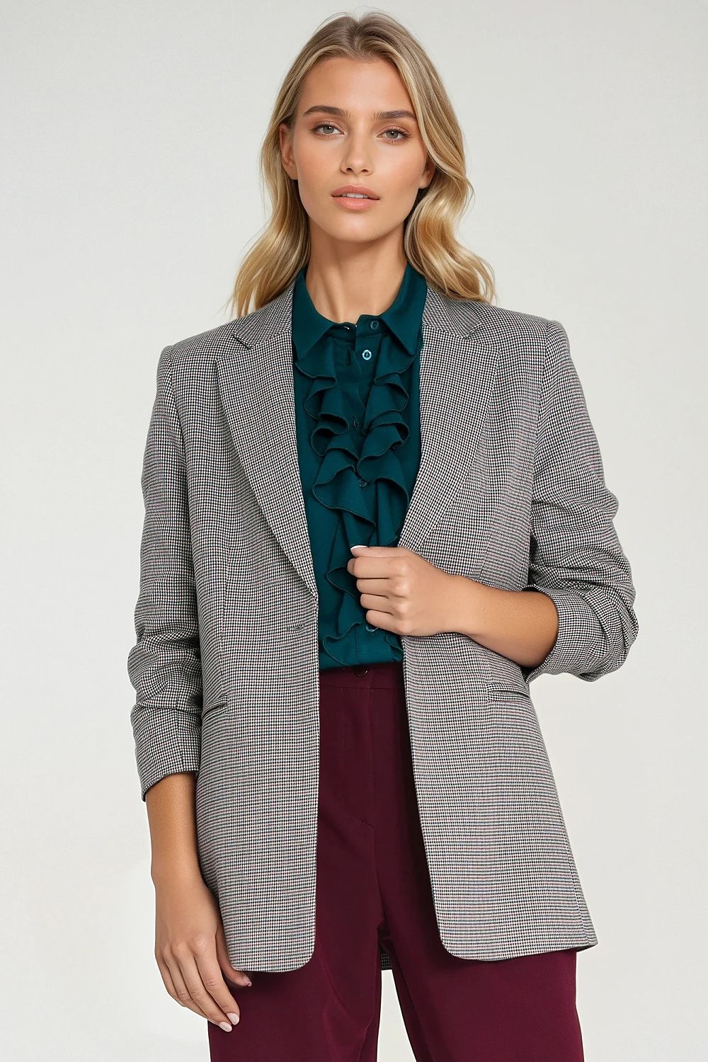 Close-up of Nife's stylish women's houndstooth jacket details, showcasing the delicate small pattern and quality craftsmanship.