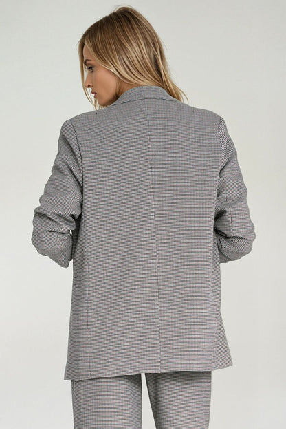 Model wearing Nife's Elegant Houndstooth Jacket in a fashionable ensemble, perfect for both business and casual occasions.