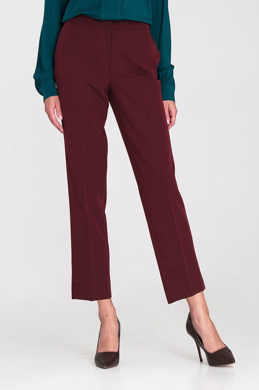 Elegant women's trousers by Nife featuring a tapered leg silhouette and stylish side slit, perfect for sophisticated office wear and chic casual outfits.