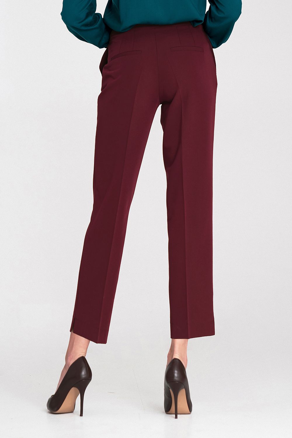 Luxury Nife women's trousers showcasing a modern taper and pressed creases, suitable for sophisticated office or casual wear.