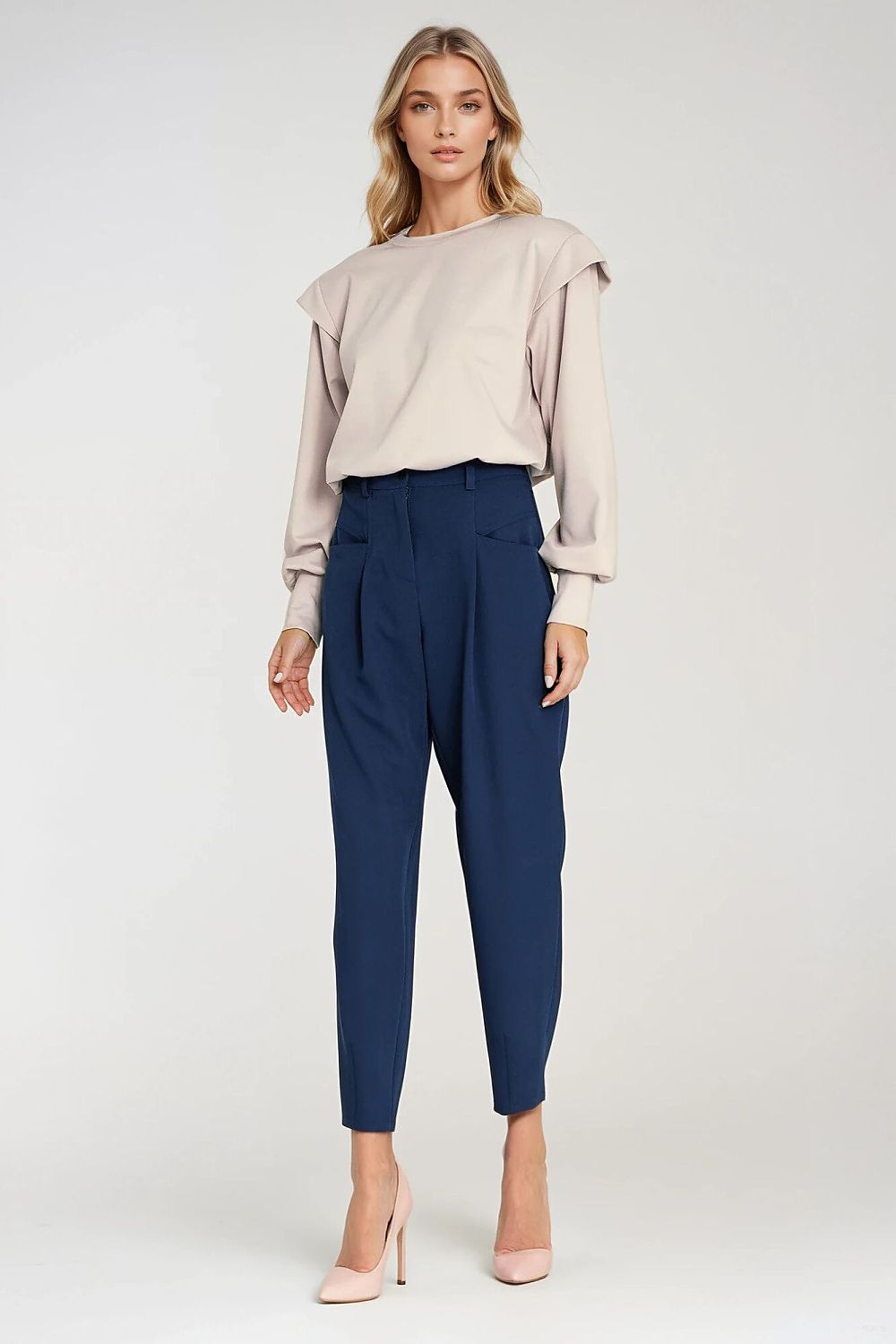 Close-up of Nife Women's High Waist Balloon Trousers showcasing the exquisite craftsmanship and trendy design with statement pockets, perfect for effortless style.
