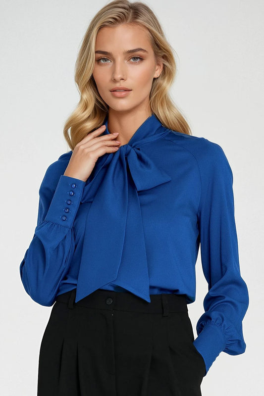 Nife elegant women's viscose blouse with decorative cuff buttons, showcasing a stylish design ideal for versatile occasions.