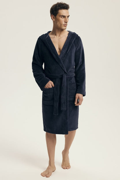 Luxury Henderson Men's Hooded Bathrobe in elegant knee-length design, featuring pockets and a belt tie, perfect for relaxation at home.