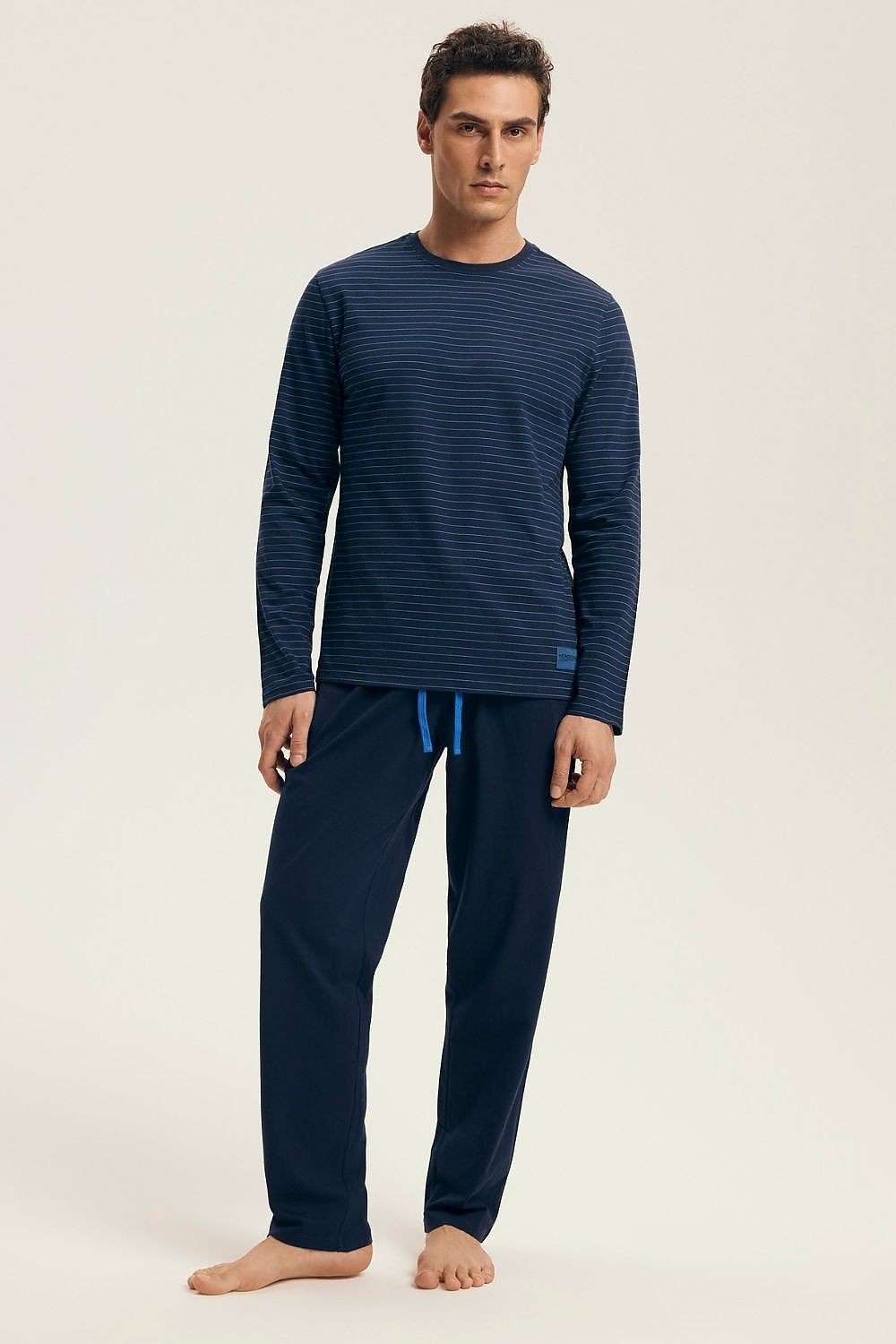 Luxurious Henderson men's striped cotton pyjamas set featuring a relaxed fit long sleeve shirt and pants, ideal for sophisticated sleepwear. Perfect for ultimate comfort and style.