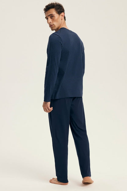 Elegant Henderson men's cotton pyjamas showcasing a fashionable striped pattern, complete with a comfortable elastic waistband and drawstrings for a tailored fit. Perfect relaxation attire.