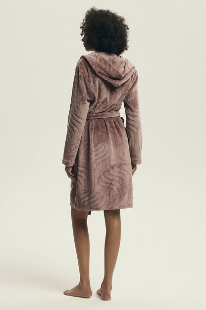 Luxury women's hooded bathrobe by Henderson, crafted from soft polyester with a knee-length design, featuring practical pockets, perfect for cozy home relaxation.