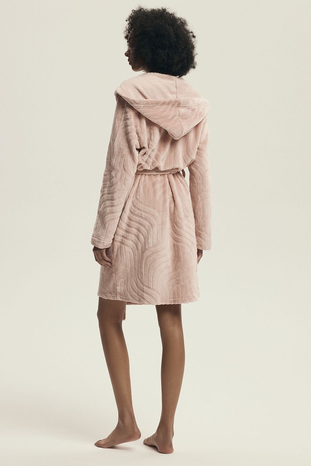 Stylish knee-length women's bathrobe by Henderson made of embossed soft polyester, showcasing comfort and feminine elegance.