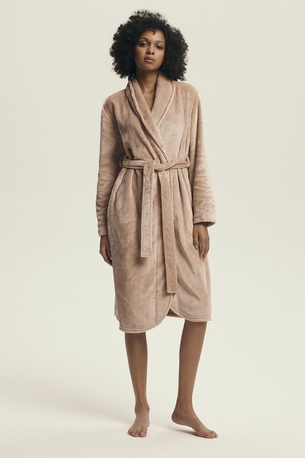 Elegant women's Henderson bathrobe made of shiny knit fabric, showcasing its luxurious design, comfortable fit, and adjustable waist tie, perfect for chic loungewear or a stylish gift option.