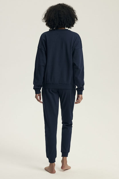 Soft and breathable Henderson women's pajamas showcasing a modern casual design with a round neckline and cuffs, ideal for a luxurious homewear experience.