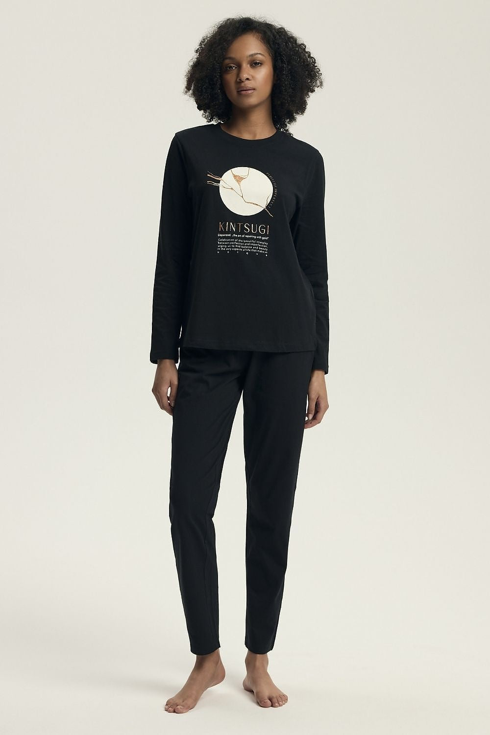 Henderson Women's Luxury Cotton Pyjama Set featuring a classic long sleeve blouse with a feminine slogan and wide elastic pants, elegantly designed for comfort and style, available in sizes S to XXL.