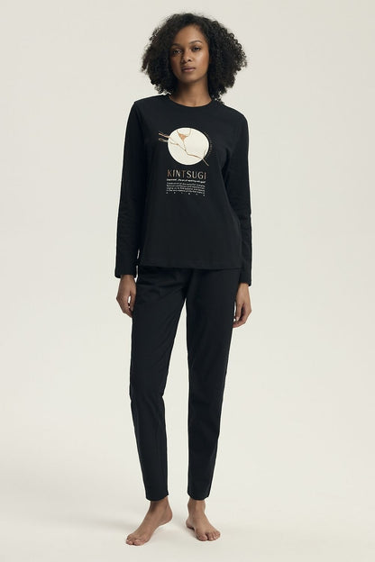 Henderson Women's Luxury Cotton Pyjama Set featuring a classic long sleeve blouse with a feminine slogan and wide elastic pants, elegantly designed for comfort and style, available in sizes S to XXL.