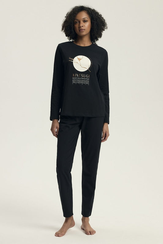 Henderson Women's Luxury Cotton Pyjama Set featuring a classic long sleeve blouse with a feminine slogan and wide elastic pants, elegantly designed for comfort and style, available in sizes S to XXL.