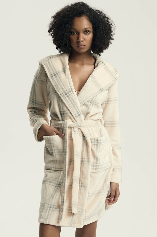 Luxurious knee-length women's hooded bathrobe in soft polyester by Henderson, showcasing a stylish feminine print and practical pockets.